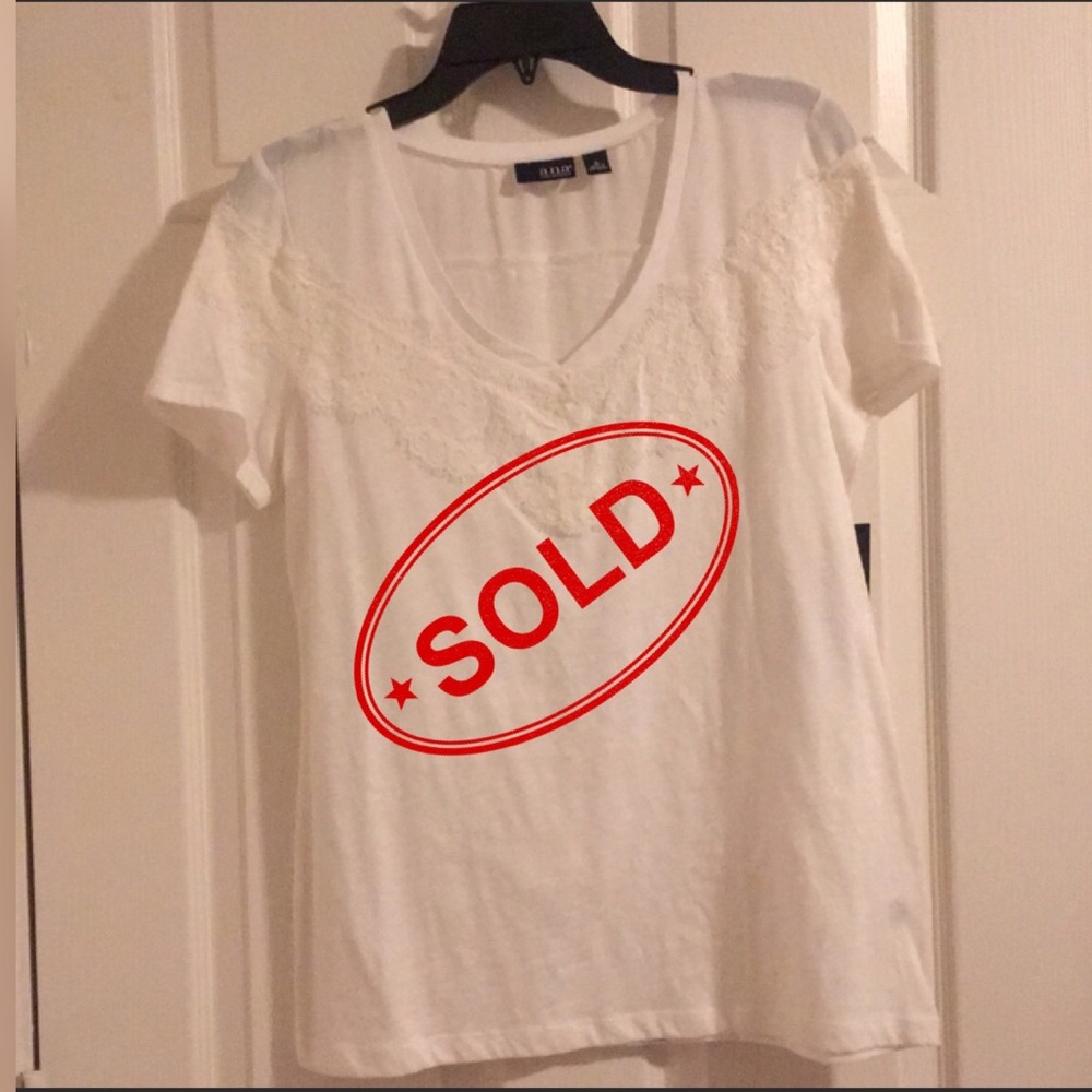 White top with neckline detail